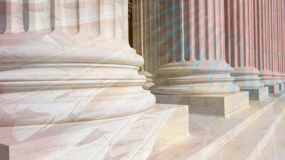 U.S. Supreme Court building in Washington, D.C., showcasing its neoclassical architecture and prominent steps.