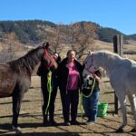 Photo with horses of Audra Deputee Kolodziejski and Rebecca Deputee